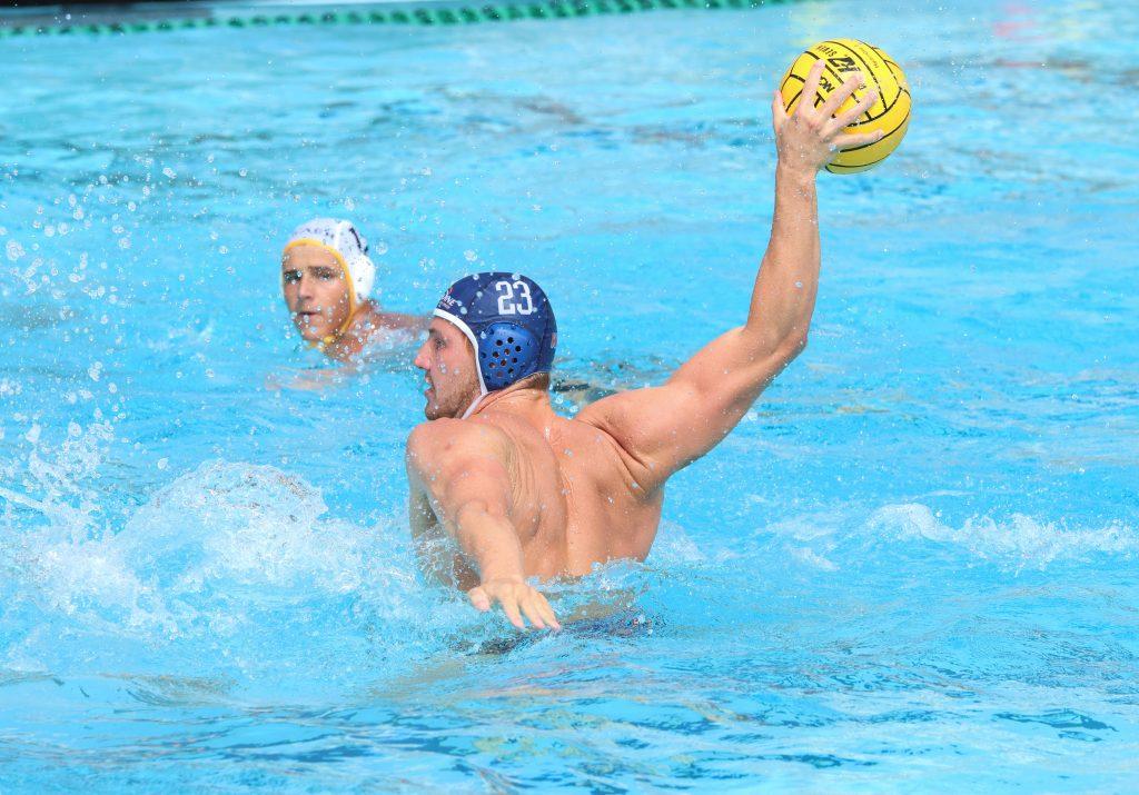 Junior attacker Adam Csapo prepares a shot at Raleigh Runnels Memorial Pool on Sept. 28. Csapo's performance was highlighted by his three goals and three assists.