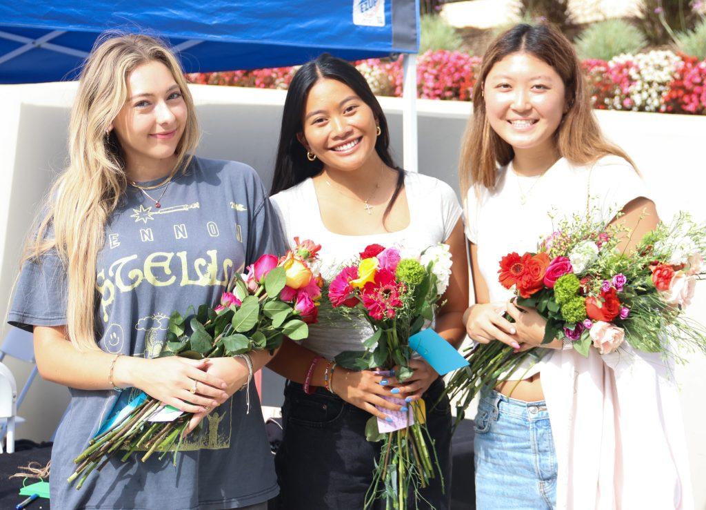 Students create bouquets Oct.17 to mark the one-year anniversary of the Oct. 17, 2023 PCH crash. Interfraternity Council and Panhellenic hosted the event. Photos by Olivia Schneider