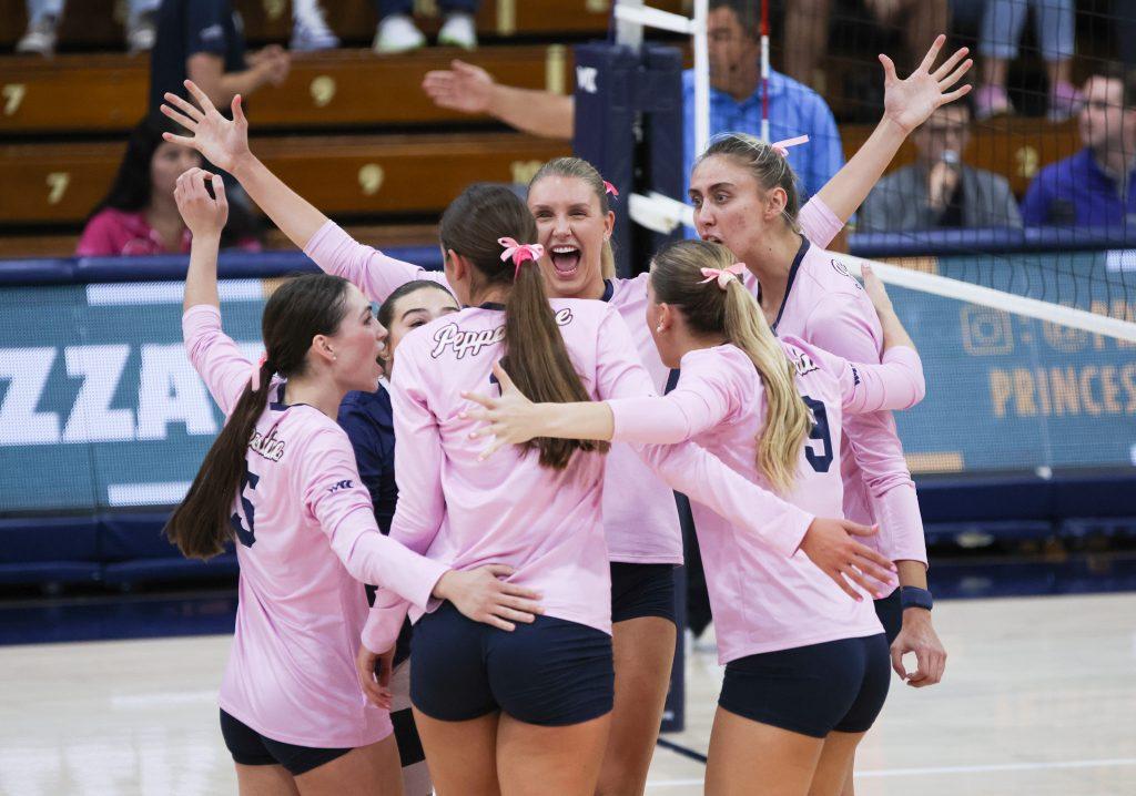 The Waves celebrate a kill after a long rally against the Saint Mary's College of California Gaels on Oct. 17, at Firestone Fieldhouse. Pepperdine entered their second home conference match this season with a 4-1 record. Photos by Olivia Schneider