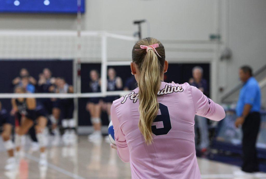 Junior setter Rosemary Archer prepares a serve against St. Mary's on Oct. 17, at Firestone Fieldhouse. Archer was a defensive threat on the court, securing 19 digs for the Waves.