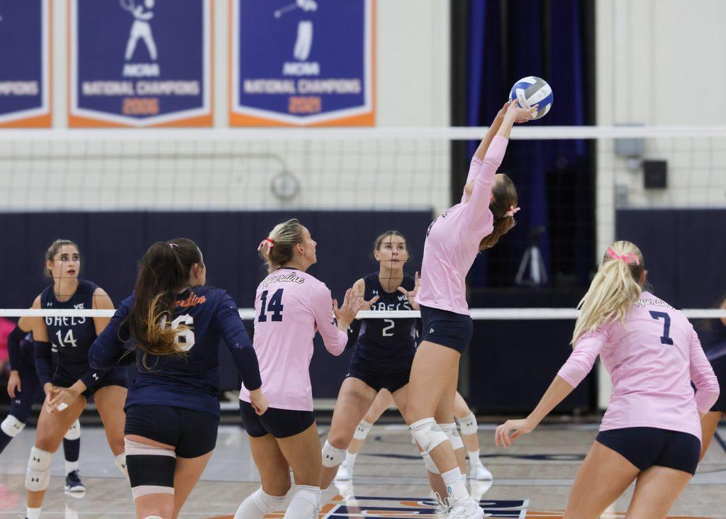 Archer sets the ball up for a pass to a Waves teammate against St. Mary's on Oct. 17, at Firestone Fieldhouse. Archer followed in her teammate Hendrickson's footsteps ending the night with a season high 49 assists.