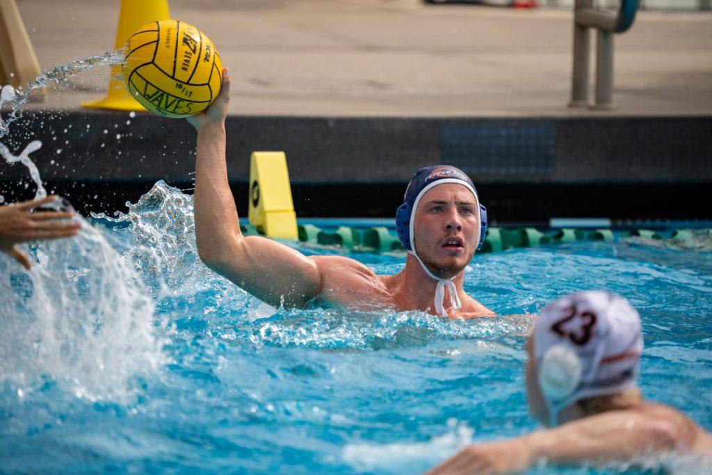 Junior attacker Adam Csapo controls the ball against Princeton on Oct. 15 at Raleigh Runnels Memorial Pool. Csapo has scored 45 goals and has 30 assists this season.