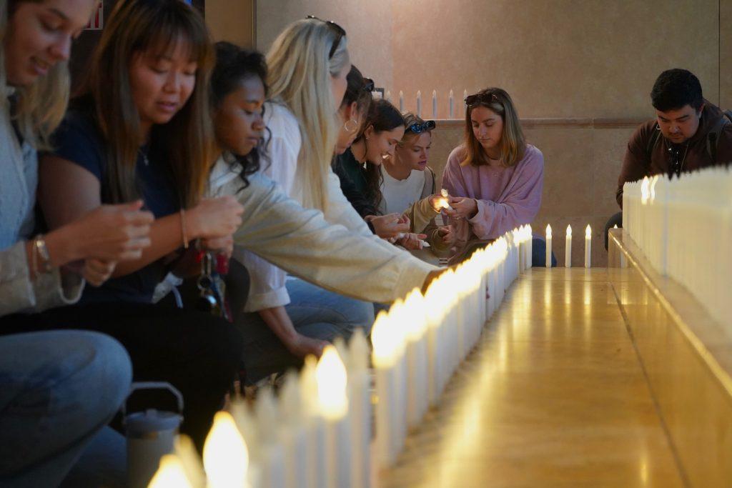 Students gather inside Stauffer Chapel to light candles in memory of Niamh Rolston, Peyton Stewart, Asha Weir and Deslyn Williams during the one-year anniversary of the PCH crash. Students also gathered behind the chapel at the Four Lights Memorial for the lantern lightings at sundown Oct. 17.