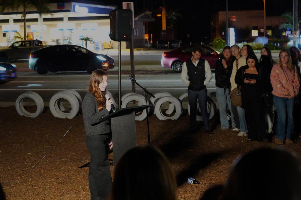 Bridget Thompson, close friend of the four women spoke during the candlelight vigil at the Ghost Tire Memorial on Oct. 17. Thompson is an active advocate for PCH safety.