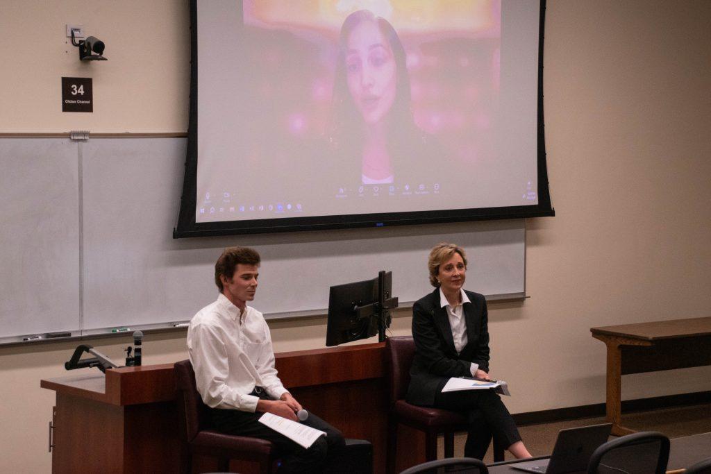 Kruashvili (on screen on the right) discusses the conflicts circling around the Georgian election. Graffy (right) and moderator Reid Jackson (left) listen to Kruashvili discuss Georgia's current political situation.