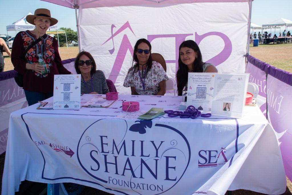 Members of the Emily Shane Foundation smile at the check-in table Oct. 20 at Alumni Park. Pepperdine University hosted the Foundation for their annual fall fundraiser. Photos by Perse Klopp