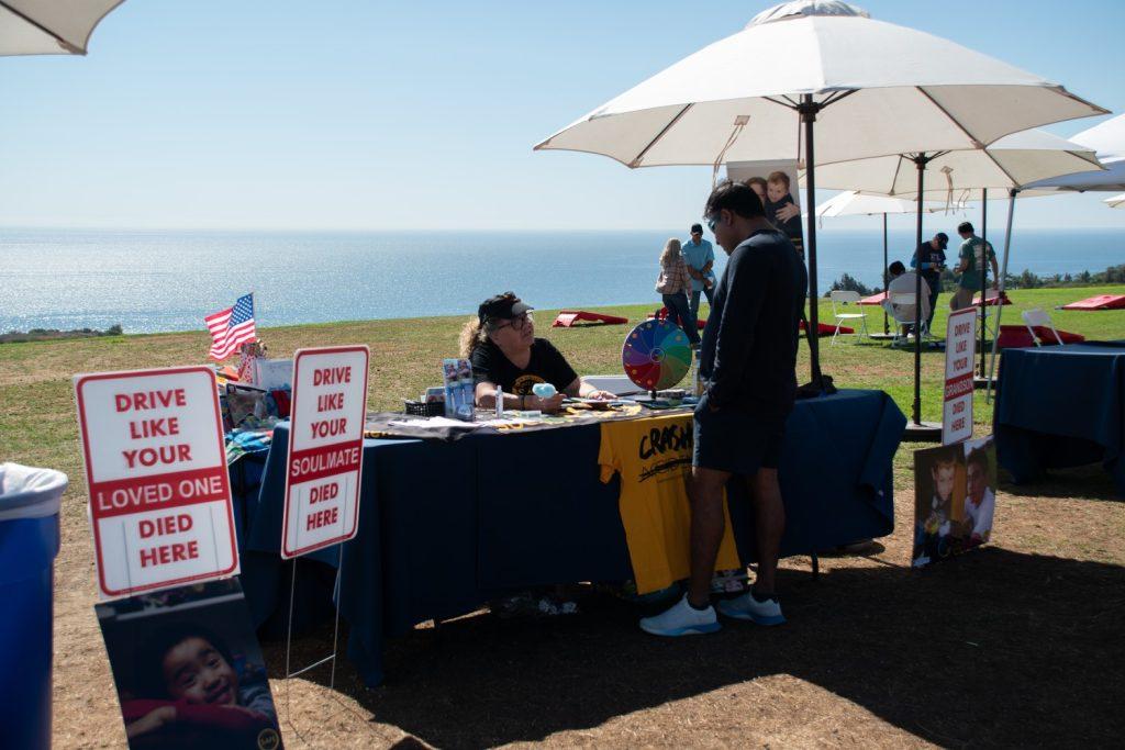 Beverly Shelton's booth set up Oct. 20 at Alumni Park. Her booth was aimed toward teaching people to drive slowly and not be on their phones.