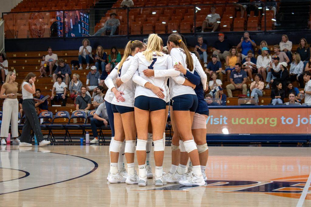 The Pepperdine Women's Indoor Volleyball team huddles in the midst of a set against the University of Southern California on Aug. 31, in Firestone Fieldhouse. The team focuses on supporting each other on and off the court. Photos by Colton Rubsamen