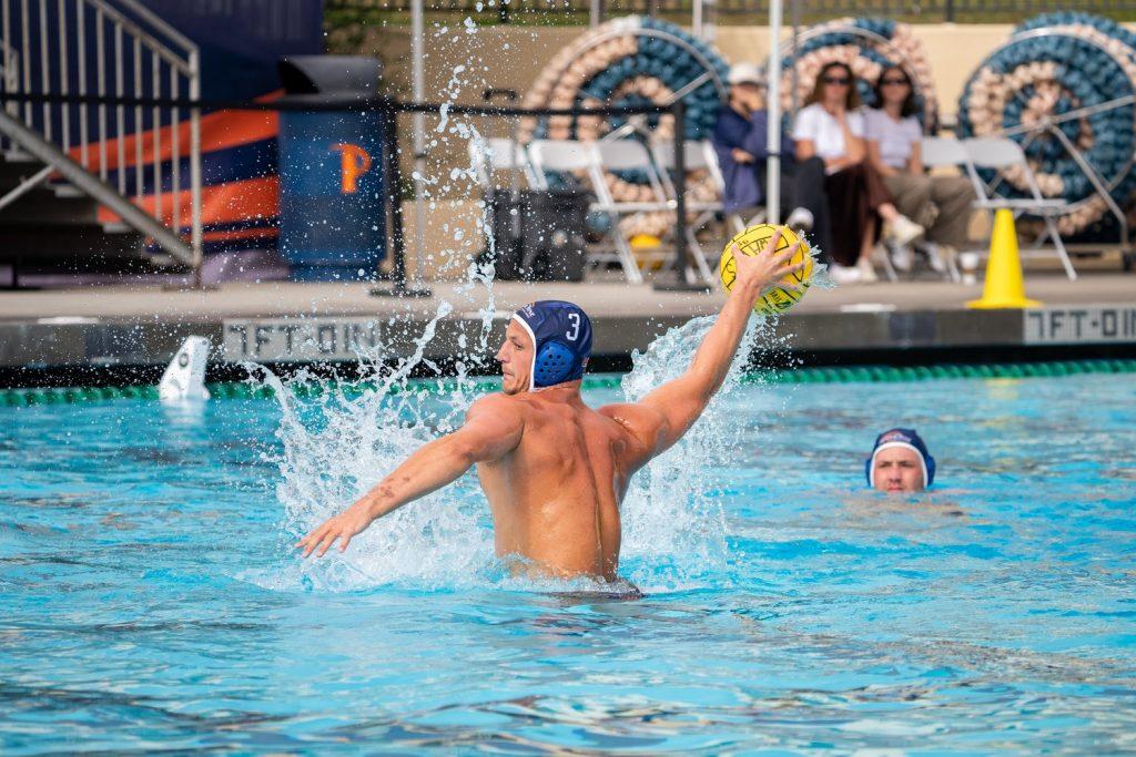 Junior attacker Sandor Gal preparing a shot against Princeton on Oct. 15 at Raleigh Runnels Memorial Pool. Gal ended the game with one goal and four assists.