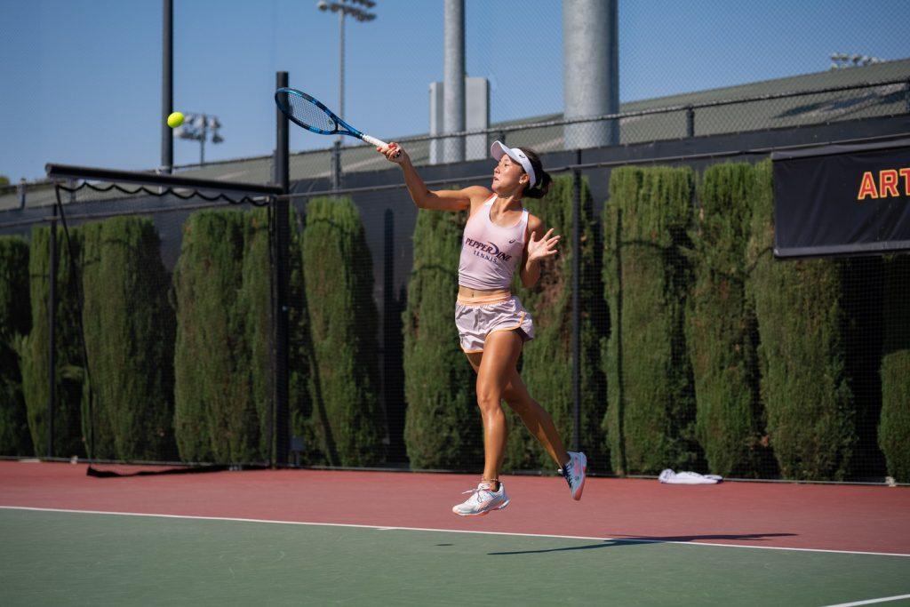 Freshman Alexia Harmon serves for her singles match Oct. 5 against Tennessee at the David X. Marks Tennis Stadium in Los Angeles. Harmon debuted in collegiate play in this tournament recording four total sets won from Oct. 4 to Oct. 6.