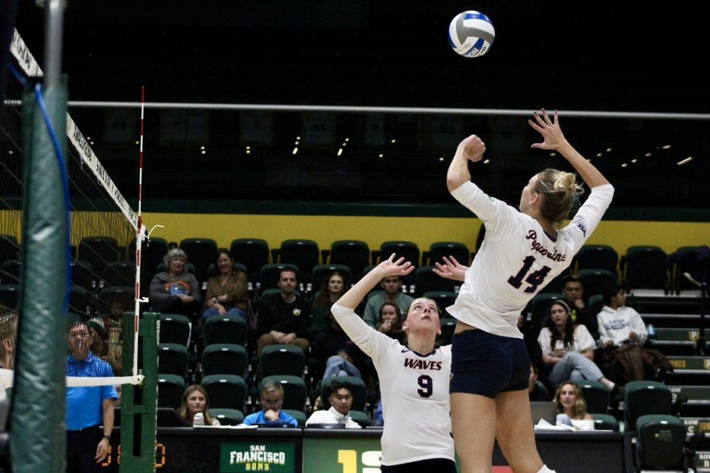 Junior middle blocker Kenadie Patterson attempts a kill with the set from junior setter Rosemary Archer on Oct. 24 at the War Memorial at the Sobrato Center. Patterson had six kills and Archer had 48 assists in the match.