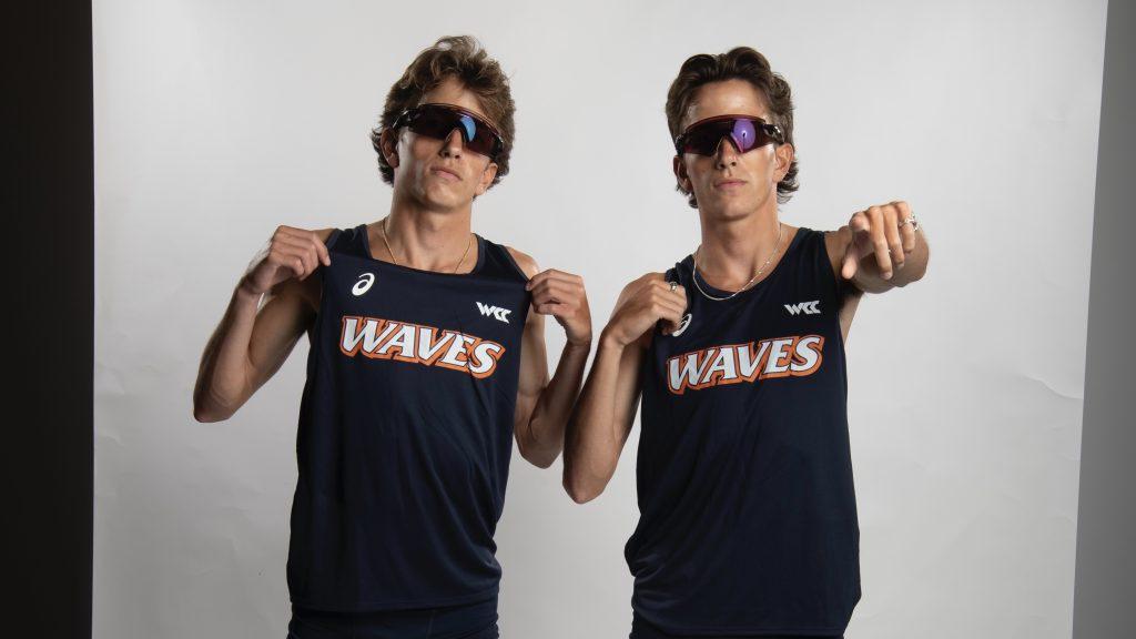 Sophomore twins Rowan Nilsen (left) and Gordy Nilsen (right) pose in their cross country uniforms for media day Aug. 21. The two said they have always pushed one another to be the best they can. Photo courtesy of Gordy Nilsen