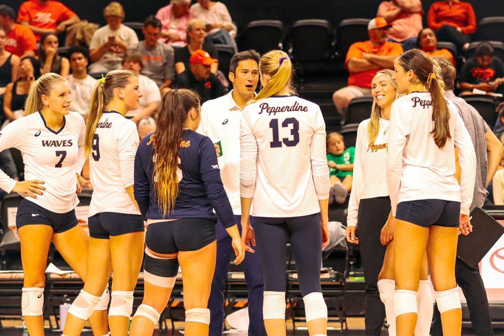 Head coach Scott Wong addresses the team in a huddle against Oregon State on Sept. 26 at Gill Coliseum. Wong is in his 10th season as the team's head coach. Photos courtesy of Brandon Ndungu/Daily Barometer at Orange Media Network.