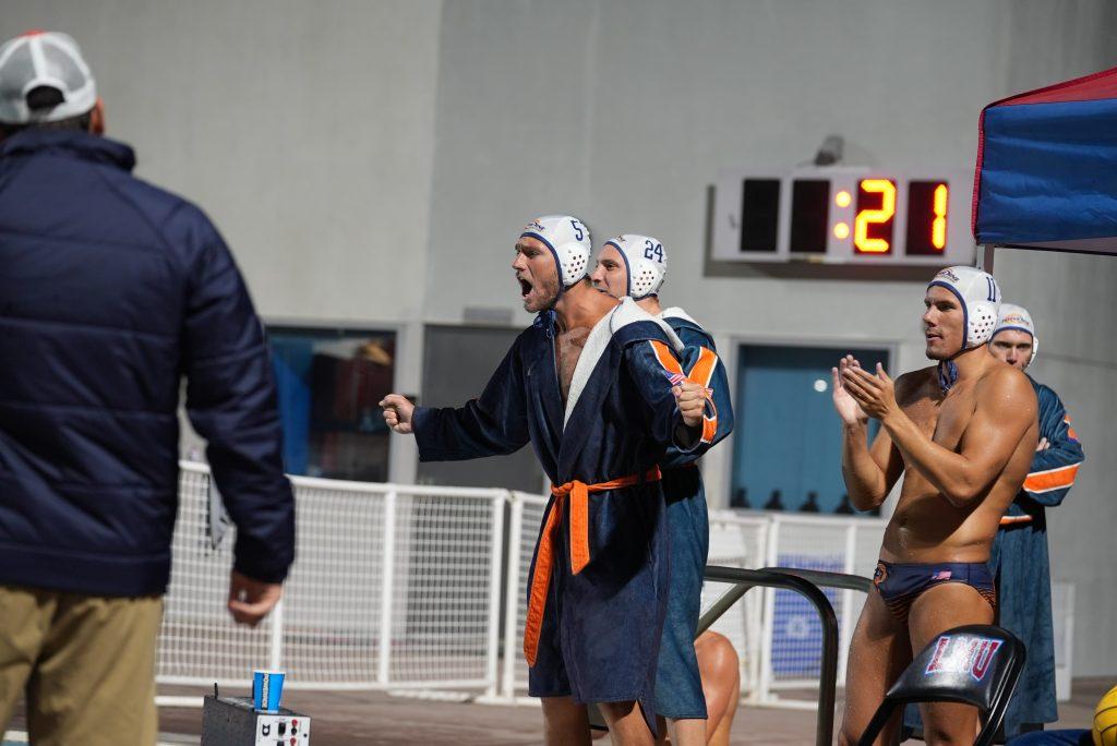 The Waves cheer on the team during their win against Loyola Marymount University on Oct. 25 at Burns Aquatic Center. Pepperdine's 12-10 win against LMU improves their conference record to 2-0.