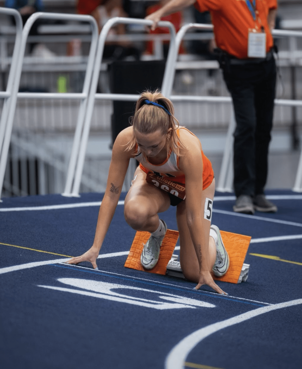 Sophomore track athlete Ava Maly prepares in her block at the 2024 MPSF Indoor Track Meet in Spokane Washington. Maly is signed with PRIME by Logan Paul x KSI. Photo courtesy of Ava Maly