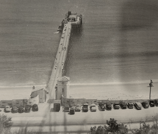 Malibu Pier is over 90 years old and still stands as a staple attraction to tourists and residents alike. This picture was taken in 1941 and went through various ownership from the Rindges to the Marblehead Land Company, to the U.S. Coast Guard during war times. Photo courtesy of Ben Marcus