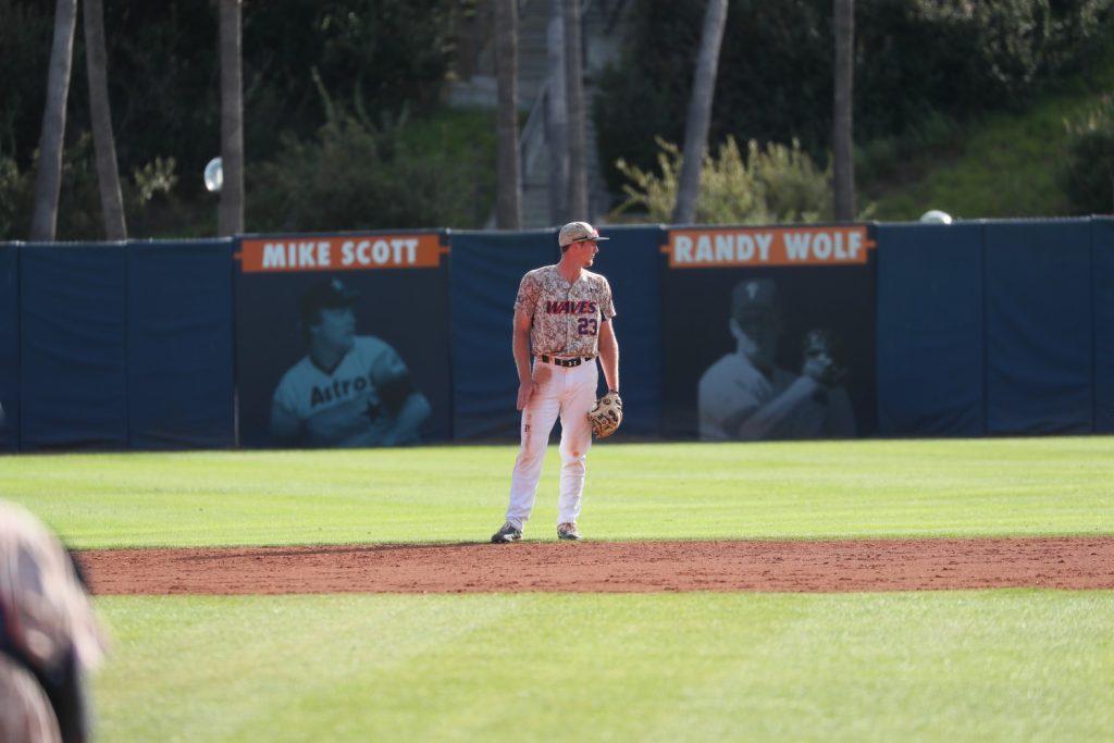 Cook scopes the diamond playing shortstop during a game for the Waves during Spring '21, at Eddy D. Field Stadium. In his senior year, Cook had a batting average of .298 across 33 games, all starts, with 39 hits, three doubles, a triple, and 17 homers (led the team) — good for 42 RBIs. Photo courtesy of Pepperdine Athletics