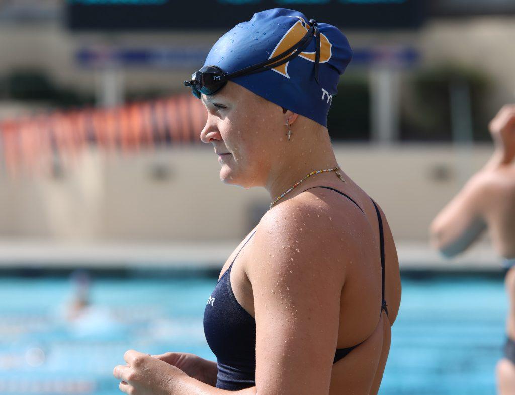 Senior butterflyer Lexie Deitemeyer steadies herself as she prepares to compete in the 100-yard backstroke event. Along with two other Pepperdine athletes, Deitemeyer secured the podium.