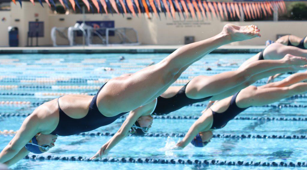 Pepperdine swimmers dive at the start of the match against Westmont College on Oct. 26 at Raleigh Runnels Memorial Pool. Pepperdine finished first in a total of 11 events, leading the Waves to a win. Photos by Olivia Schneider