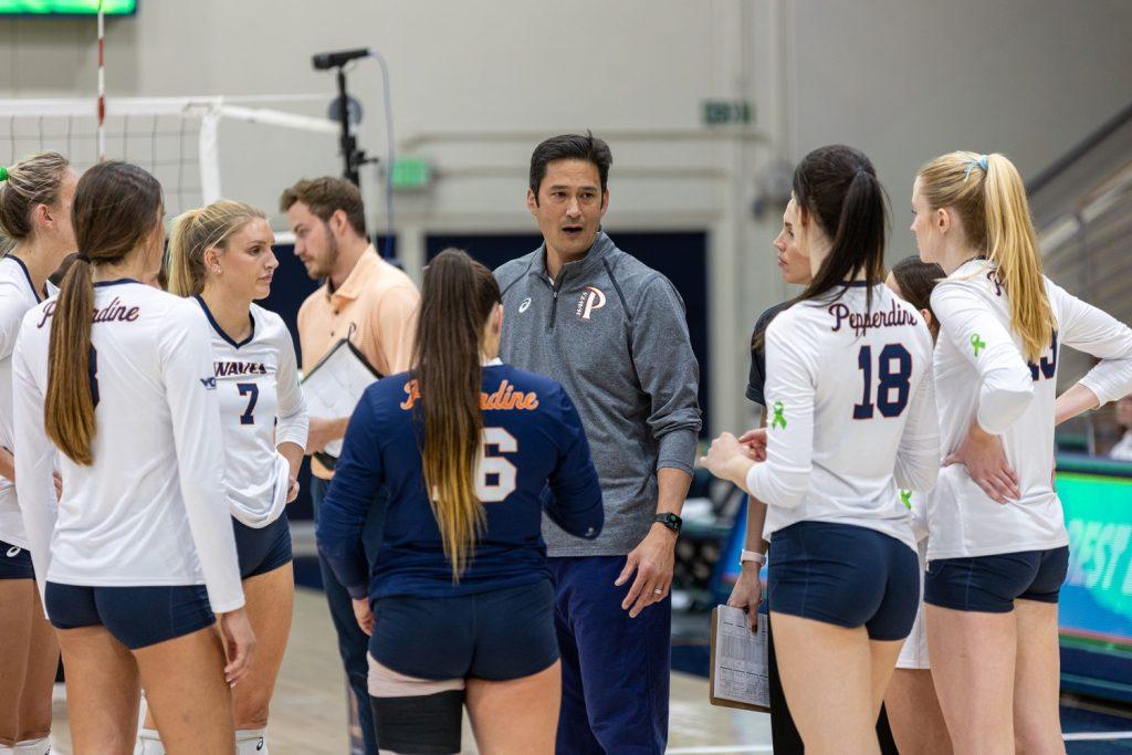 Head Coach Scott Wong rallies his team during a call challenge at Firestone Fieldhouse on Nov. 7. The Waves lost 1-3 to the Lions in the second game of the PCH Cup.