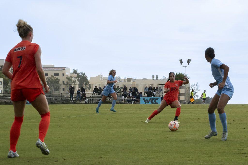 Sophomore forward Julia Quinonez and graduate defender/forward Victoria Romero counter an attack by the Toreros on Nov. 2 at Tori Frahm Rokus Field. The Toreros had four shot attempts throughout the match compared to the Waves 17.