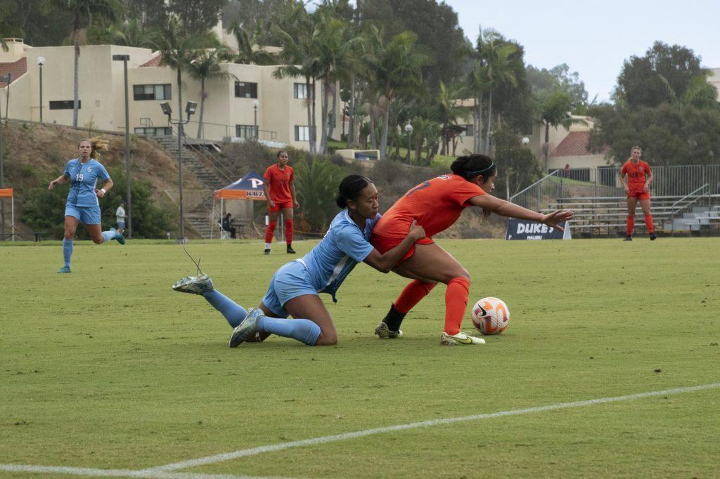 Junior midfielder Karina Gonzalez gets fouled during an attack by the Toreros on Nov. 2 at Tori Frahm Rokus Field. The Waves defense had no yellow cards on the day compared to the Toreros two.