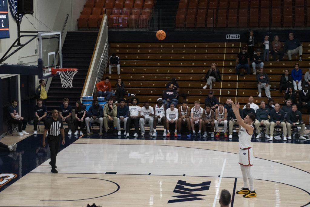 Senior forward Stefan Todorivic attempts a free throw after a technical foul from Western Illinois on Nov. 6 at Firestone Fieldhouse. Todorivic went eight for nine from the line, leading the team.