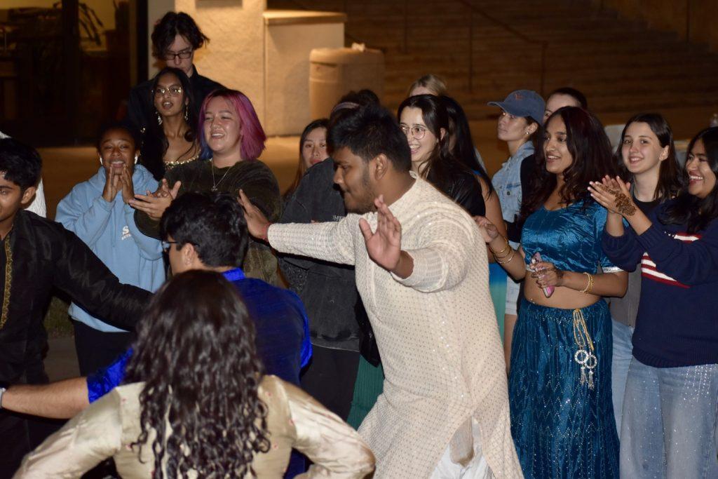 Students dance to music in Mullin Town Square on Nov. 8. The Indian Student Association has held Diwali celebrations on campus since 2017. Photos by Mary Elisabeth