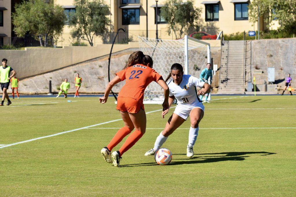 Sophomore forward Julia Quinonez dribbles past a defender against San Francisco on Nov. 9 at Tari Frahm Rokus Field. Quinonez was awarded WCC Freshman of the Year in 2023. Photo by Mary Elisabeth