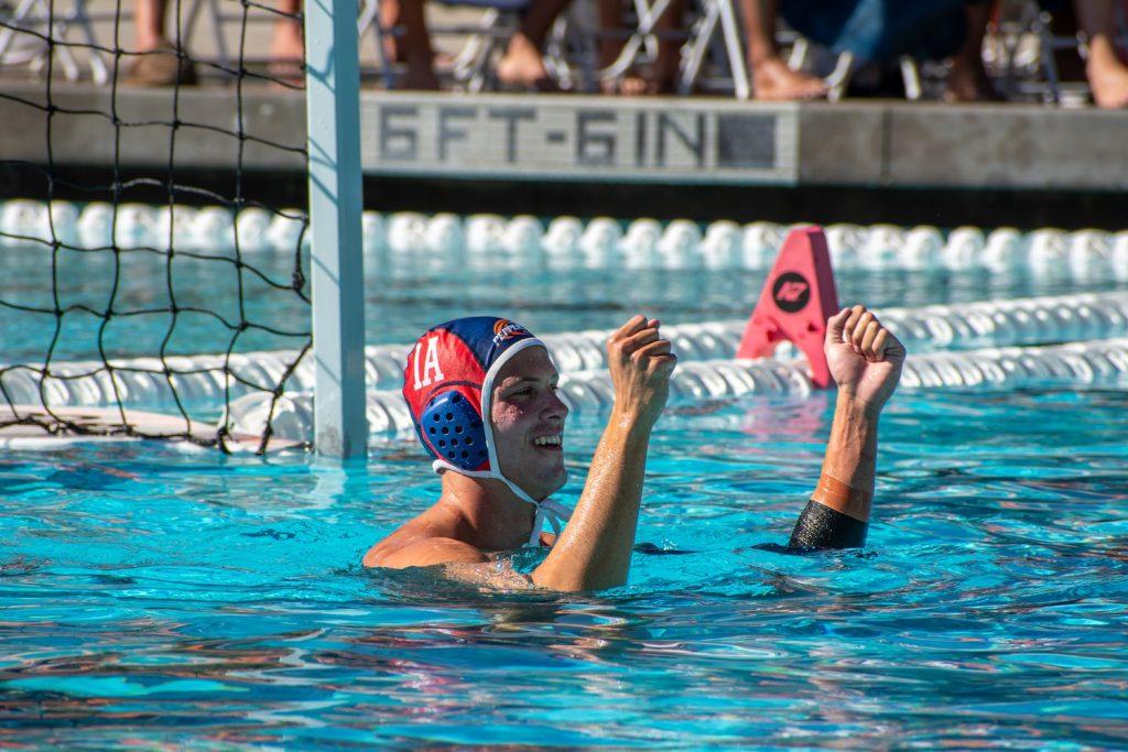 Freshman goalie Max Smirnov celebrates his offense scoring 17 goals against California Baptist. Smirnov came in to play at the start of the second half to bring a new look on defense.