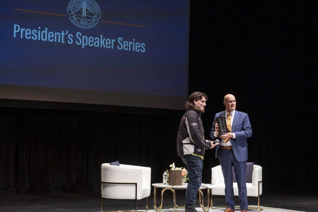 Palmer Luckey and President Jim Gash opening the President's Speaker Series on Oct.1. Luckey talked about his background as well as shared some things in technology we should look forward to. Photo courtesy of Ron Hall