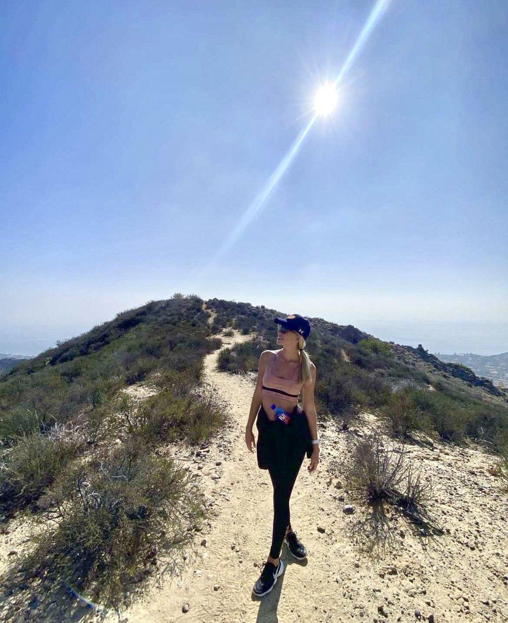 Correa takes in the scenic views on a sunny hike at the Hike to the Cross on Nov. 24, 2021. She said all the hiking trails around the area not only help her stay active, but also help her mind relax. Photo courtesy of Vianita Correa