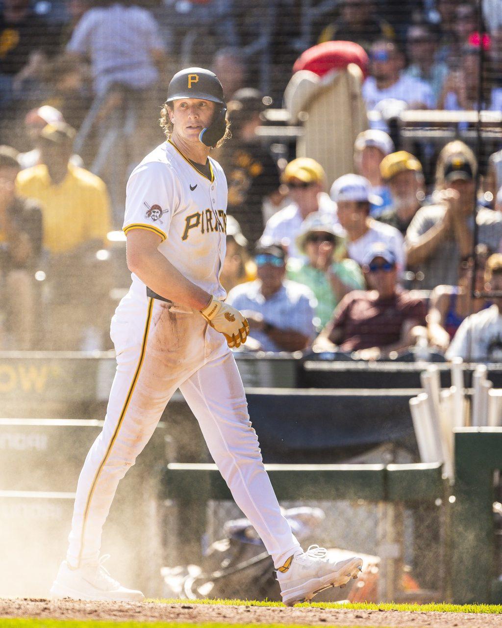 Cook looks toward the field as he walks back to the dugout during a game for the Pirates. In 16 games at the majors, Cook hit .224 with three homers and two doubles. Photo courtesy of Billy Cook