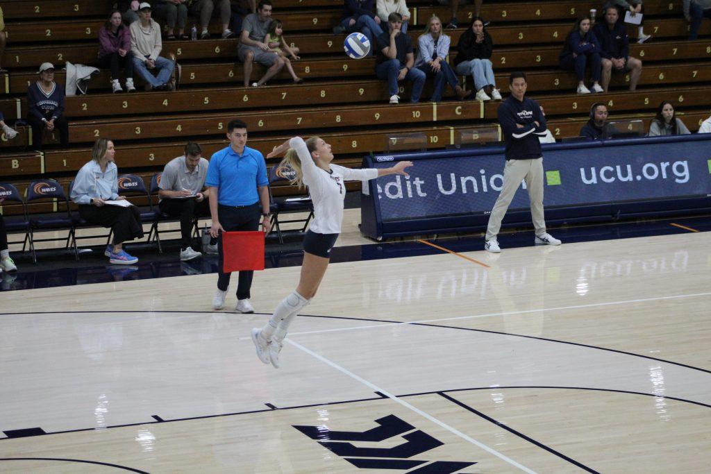 Outside hitter/opposite Birdie Hendrickson serves the ball against the University of San Francisco on Nov. 16 at Firestone Fieldhouse. Hendrickson finished the game with two service aces.