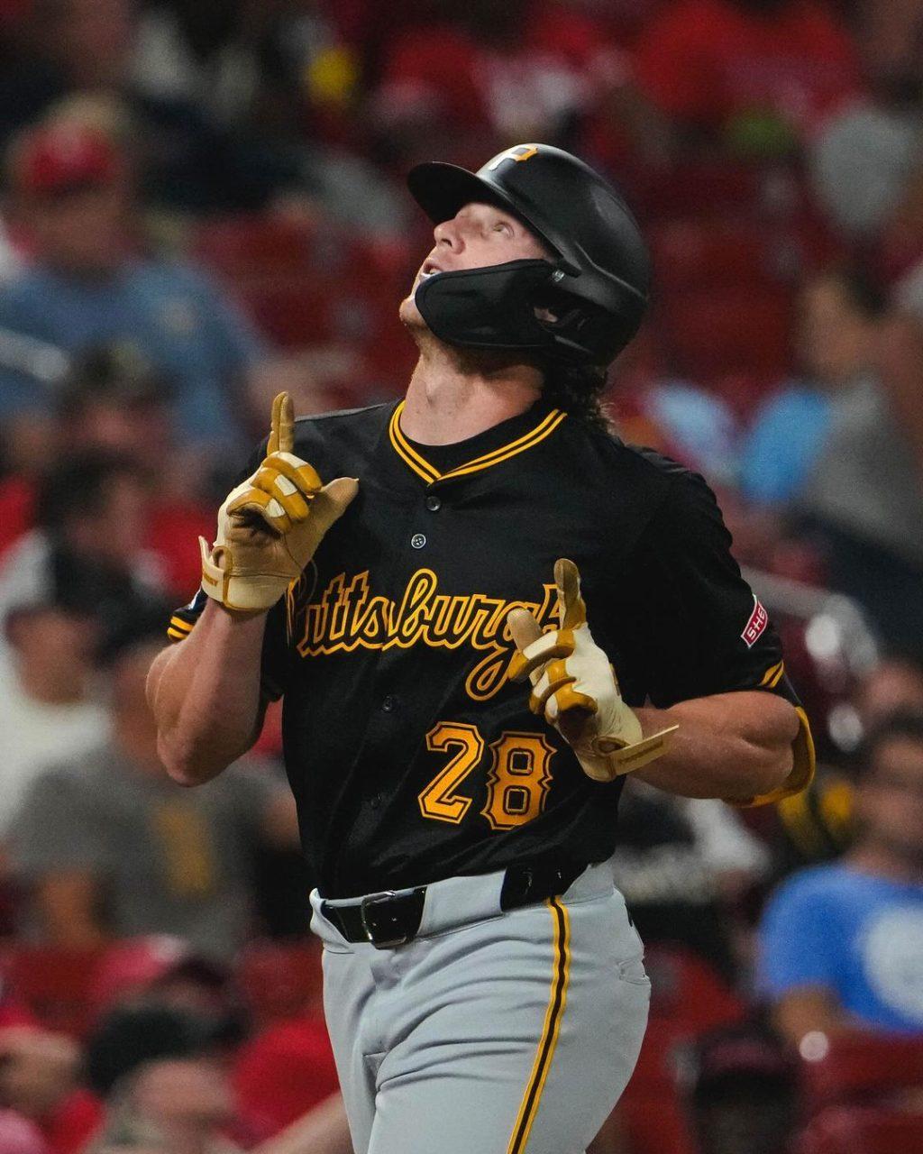 Cook points to the sky as he approaches home plate following his first career home run against the St. Louis Cardinals on Sept. 18, at Busch Stadium. Cook would record two more homers to bring his total to three in his small sample size. Photo courtesy of Billy Cook