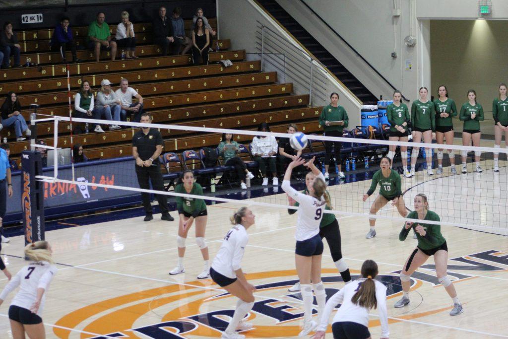 Junior setter Rosemary Archer sets the ball against the University of San Francisco on Nov. 16 at Firestone Fieldhouse. Archer finished the game with 42 assists to bring her season total to 785.