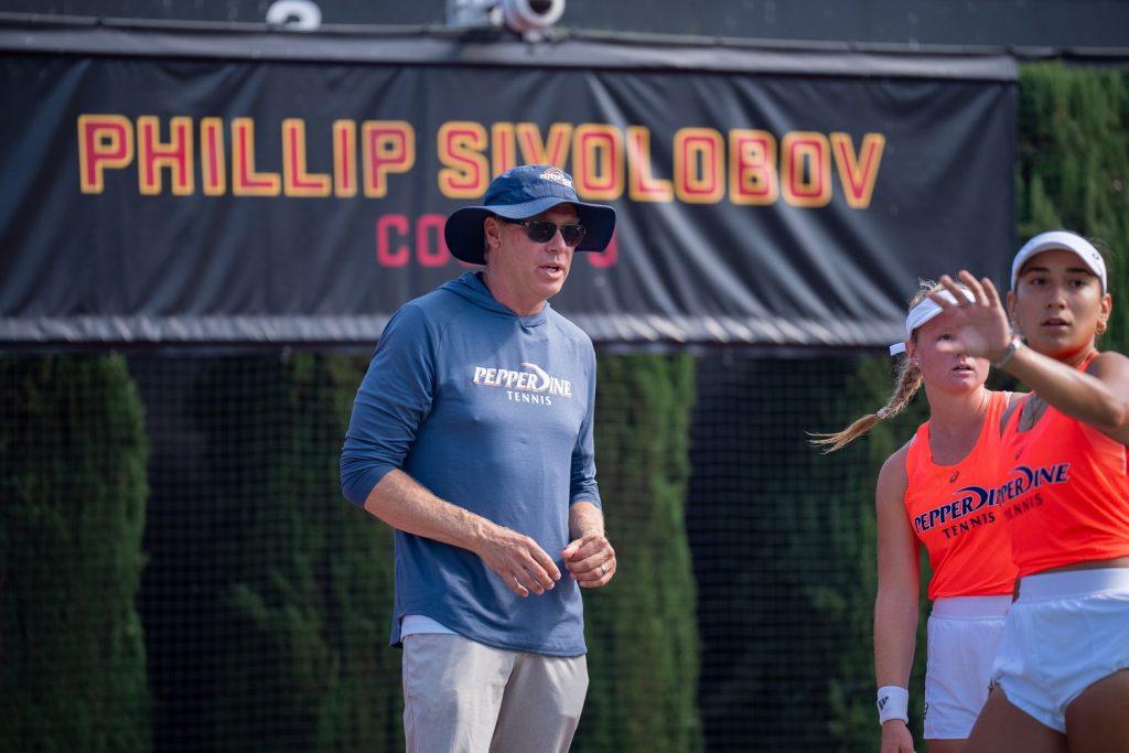 Per Nilsson, former Women's Tennis head coach, addresses his former players at the USC Women of Troy Invite on Oct. 4 at David X. Marks Tennis Stadium. Nilsson began his 11th season for the Waves before announcing his leave effective immediately Oct. 29. Photo courtesy of Pepperdine Athletics