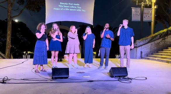 Won by One performs at the All-School Candlelight Gathering at the amphitheater Fall 2024. They sang for the Pepperdine community gathered at the event. Photos courtesy of Mackenzie Kennedy