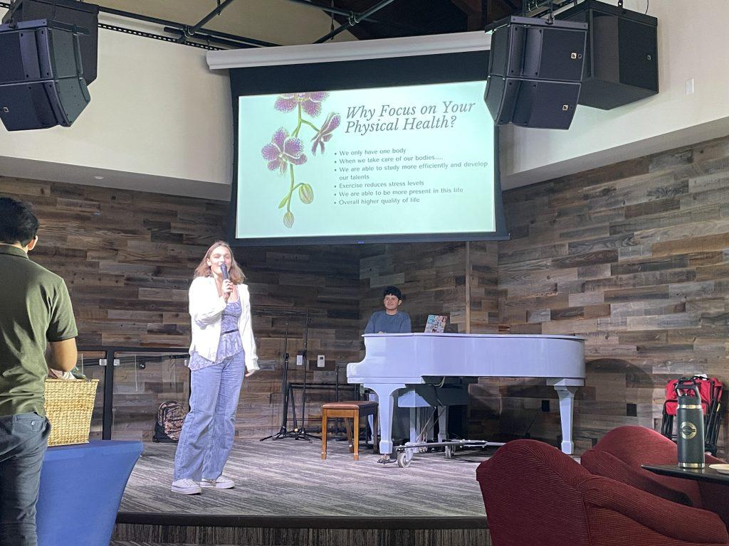 Audrey Costa presents on the importance of physical health during the Nov. 5 Crafternoon session in The Lighthouse. Physical health is one of six dimensions RISE focuses on during their Crafternoon events.