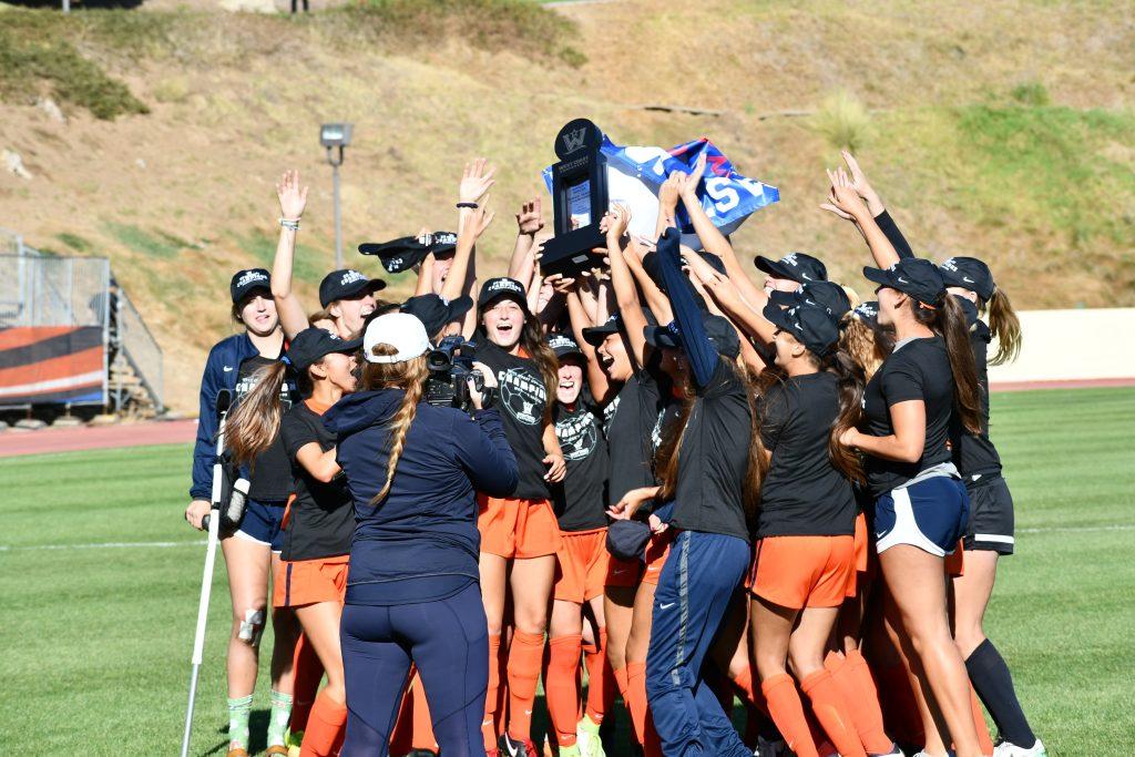 The 2017 Women's Soccer squad raises the WCC Trophy after defeating the University of Portland 4-0  Nov. 4, 2017 at Tari Frahm Rokus Field. The Waves ended this season with a 15-3-3 overall record and an 8-0-1 conference record. Photo courtesy of Pepperdine Athletics