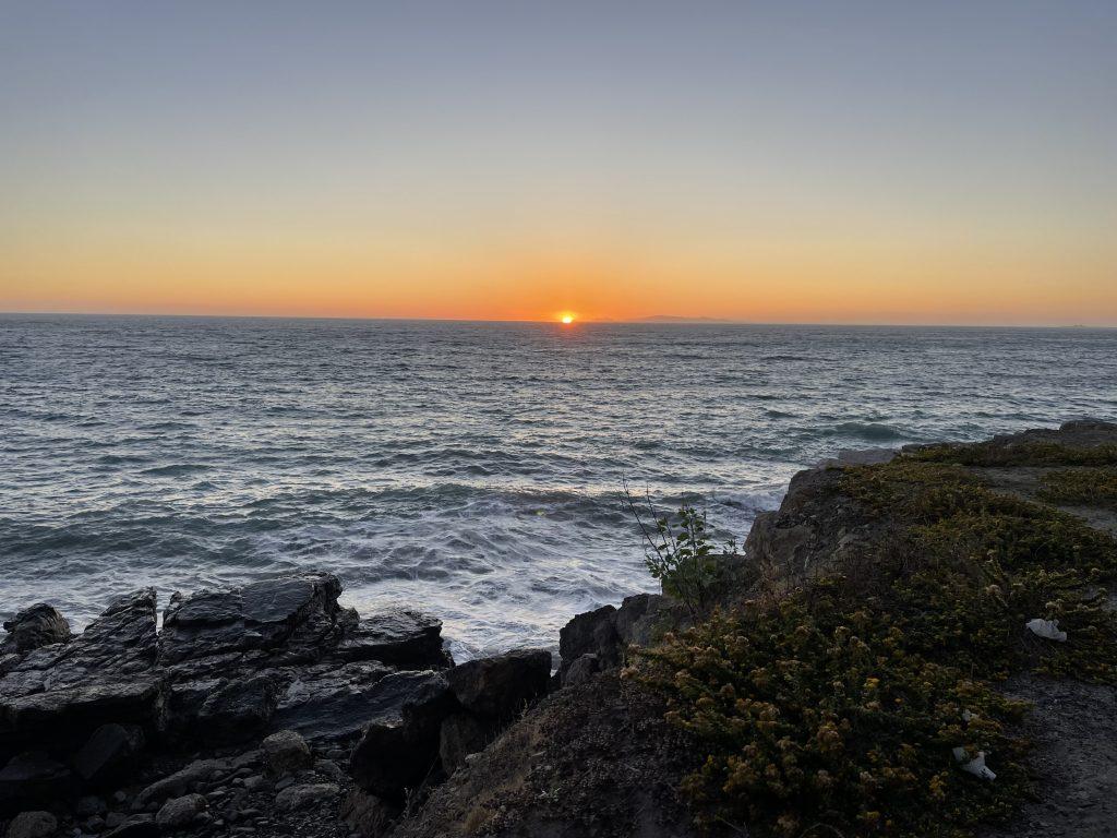 My favorite sunset picture, taken along the PCH on October 21, 2023. My grandparents, parents and one of my brothers visited me and insisted that we pulled over to take a picture: it did not disappoint.