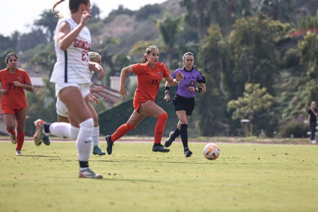 Junior midfielder/forward Tatum Wynalda advances the ball in the title match against Gonzaga University on Nov. 4, 2023 at Tari Frahm Rokus Field. Falling to the Bulldogs 1-3, Pepperdine lost their third WCC title game since 2020. Photo courtesy of Pepperdine Athletics