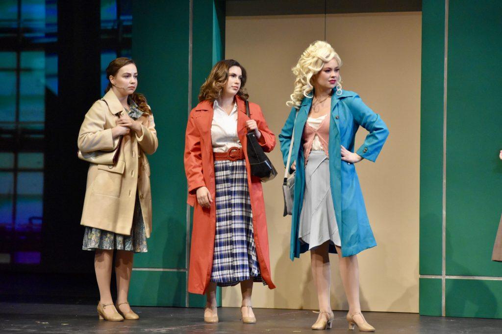 (From left to right) Judy, Violet and Doralee, respectively played by juniors Tessa Hemphill, Zoe O’Donnell and Lucy Schene, stare at a colleague as they attempt to run off and plot against their boss during a dress rehearsal in Smothers Theatre on Nov. 12. Violet and Judy initially show contempt for Doralee before realizing that they're all on the same side.