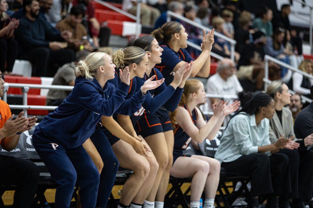 The Waves' bench cheers on their teammates against California State University, Northridge at Premier America Credit Union Arena on Nov. 27. The Waves' bench secured 24 points in the blowout win over the Matadors. Photos courtesy of Michael Moreno/Daily Sundial