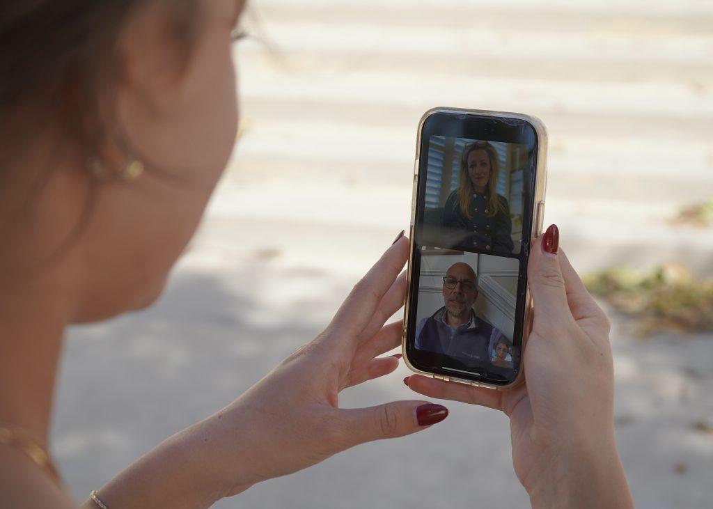 Sophomore Ava Bondi's parents, Greg and Becky Bondi, on FaceTime with their daughter.