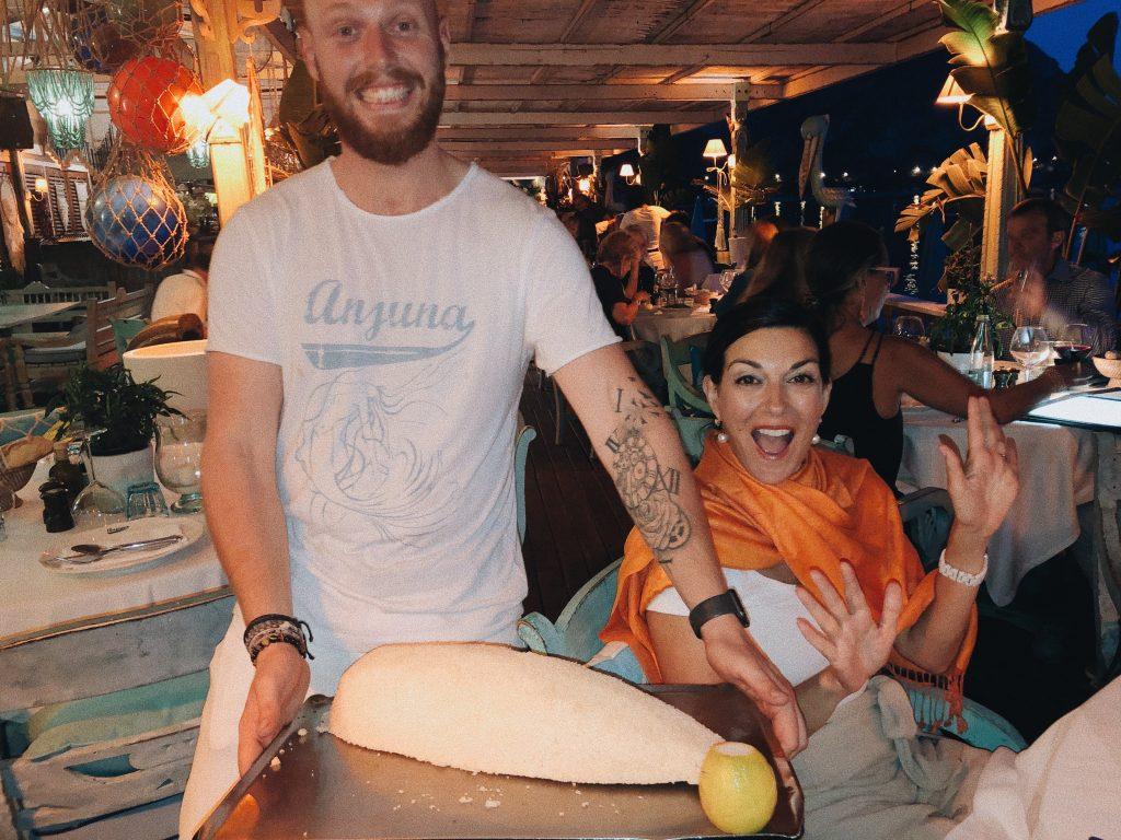 Steel out to dinner with her family at Anjuna. Her mom, Rita Steel, is pictured with a salt-crusted fish. Photo courtesy of Marla Steel