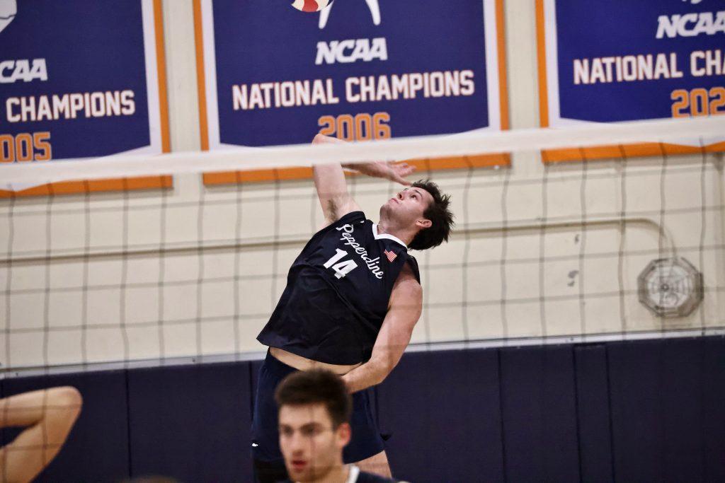 Senior outside hitter Ryan Barnett serves in the home opener against Missouri S&T. Barnett had 11 kills and the Waves finished the match with 8 aces.