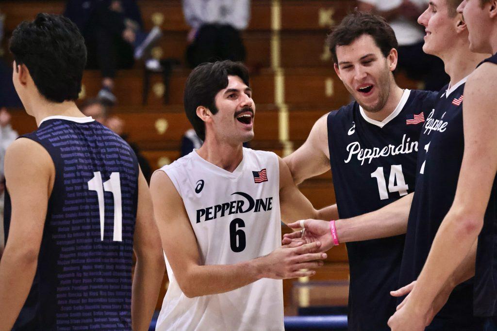 Junior libero Jacob Reilly celebrates with his teammates after a point against Missouri Science & Technology at Firestone Fieldhouse on Jan. 13. Reilly had his first game as a Wave and finished with seven digs and one kill. Photos courtesy of Pepperdine Athletics