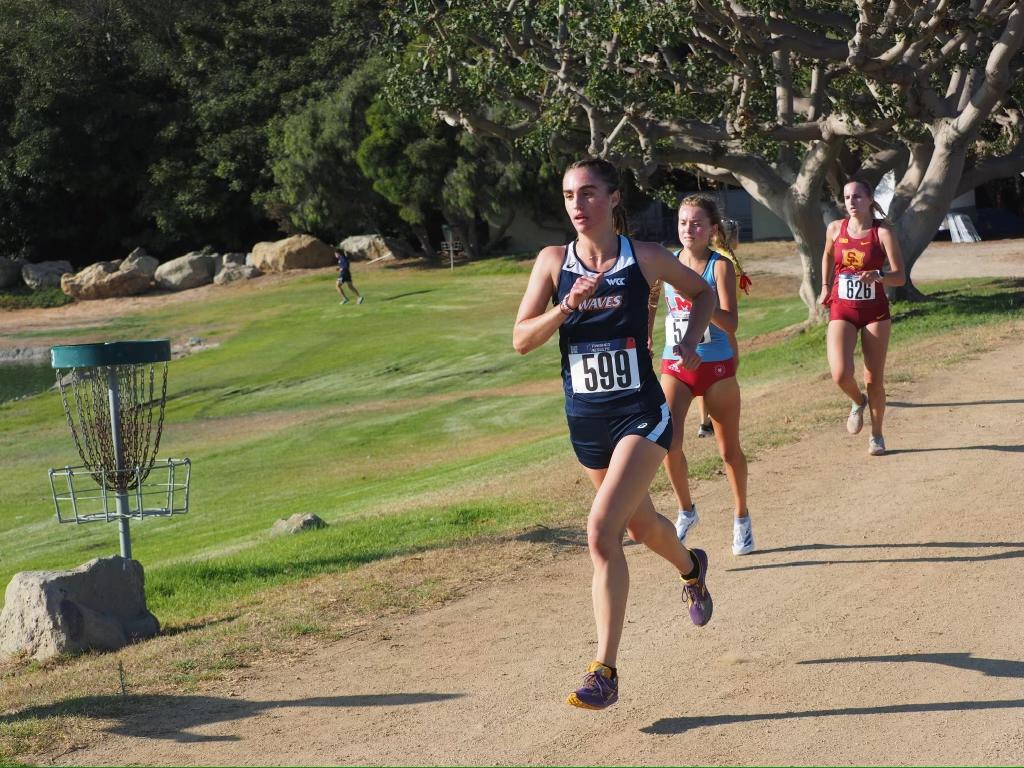 Sophomore track distance runner Hannah Miller competes at Alumni Park, running at the Waves Invitational on Aug. 30. Miller managed to secure the top 20 against other top competing schools. Photo courtesy of Hannah Miller