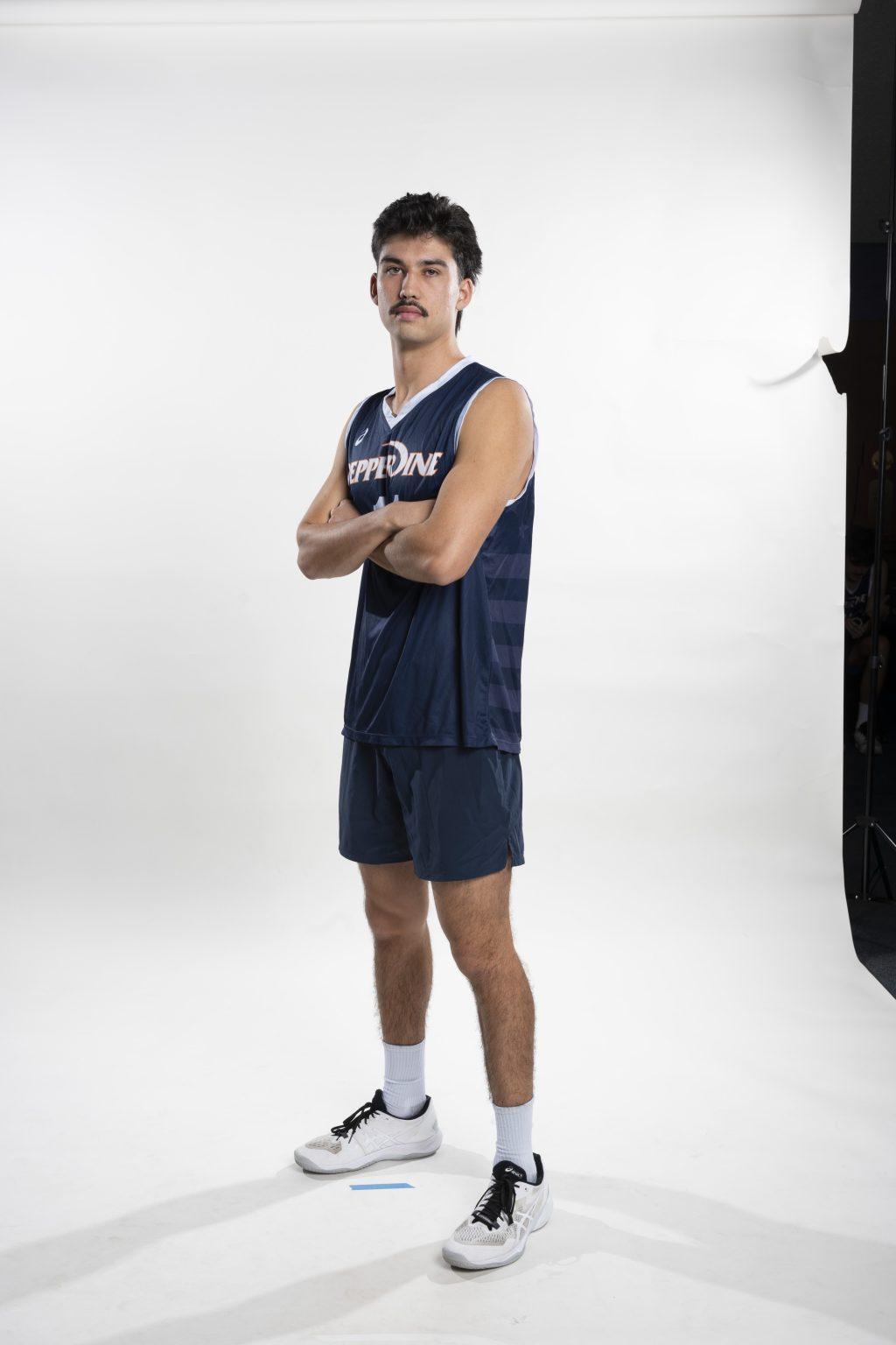 Graves poses for a photo during media day in December 2024. Even as a setter, Graves tallied 18 kills during his freshman season. Photo courtesy of Ryan Graves